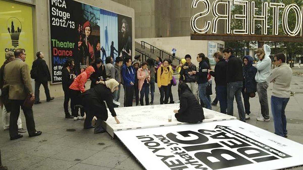 Community members were welcome to draw in the giant sketchbook